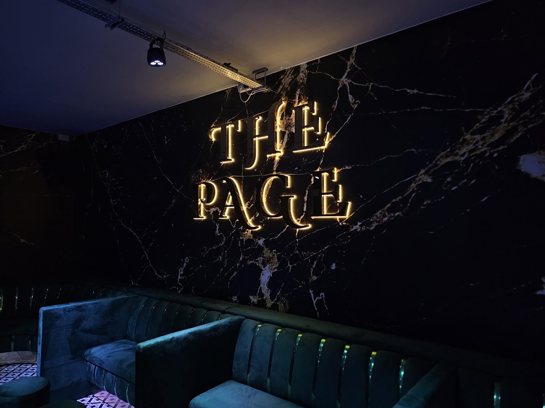 Illuminated interior display wall signage