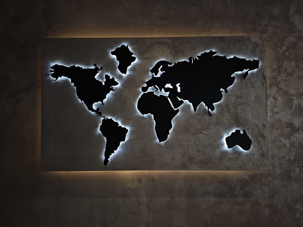 Illuminated world map wall feature