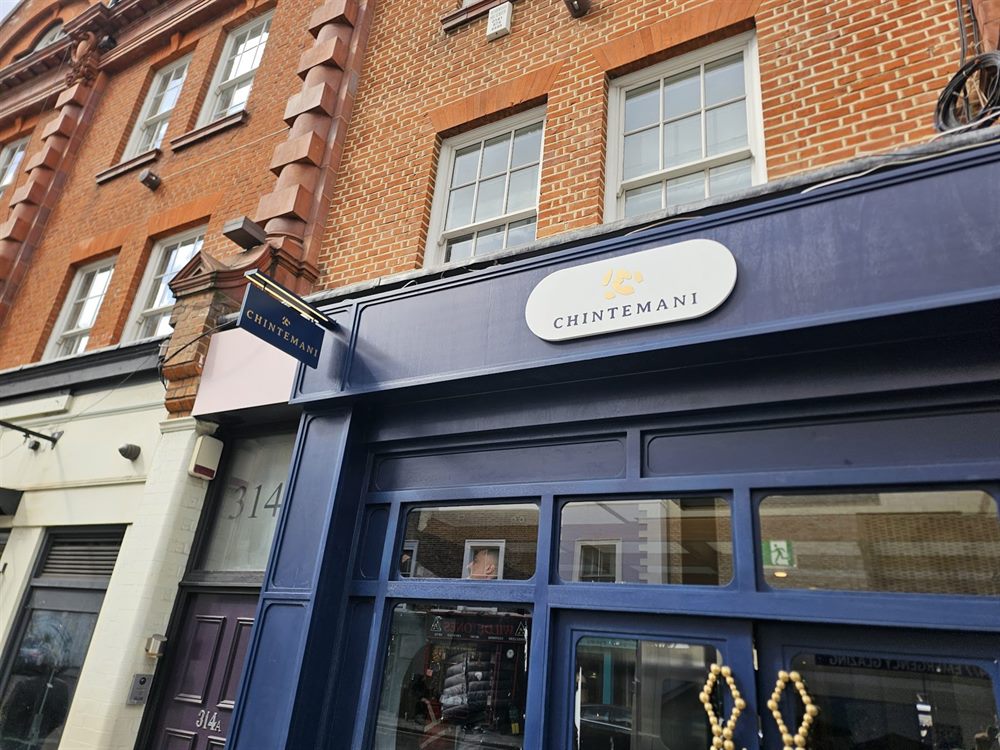 Restaurant shopfront fascia with window graphics