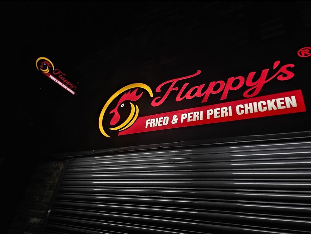 Fried chicken shop illuminated fascia