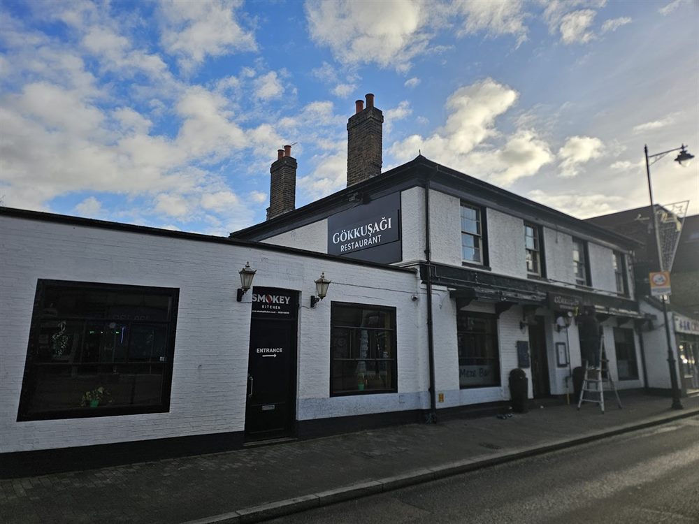 Corner restaurant frontage signage