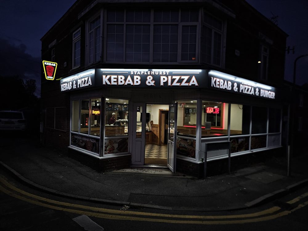 Kebab and pizza shopfront sign