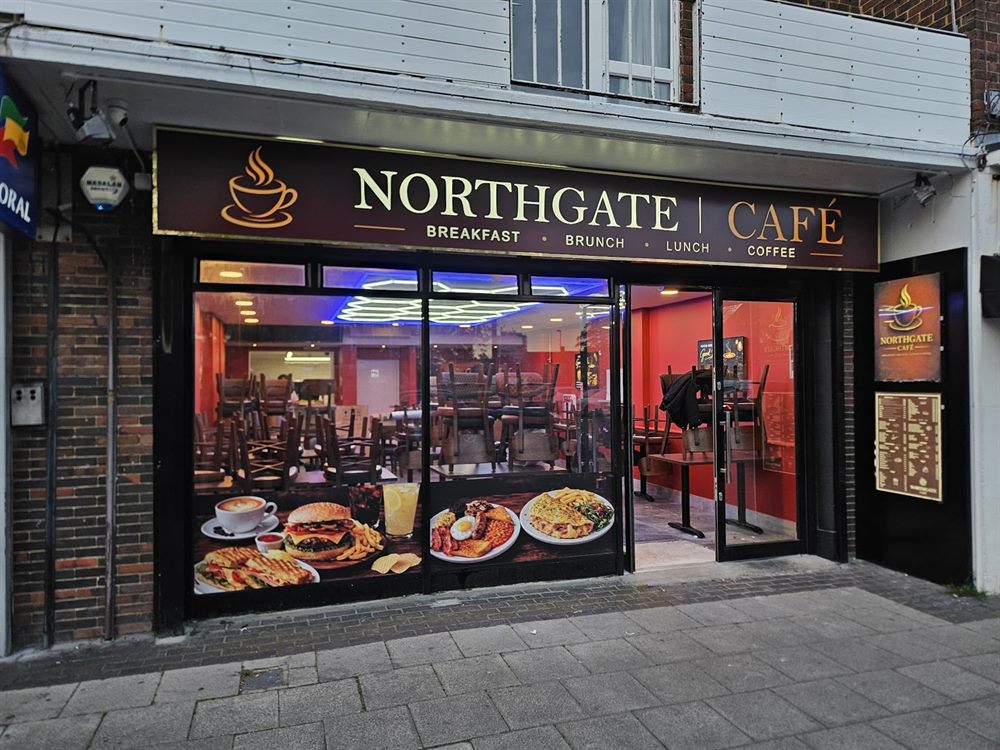 Cafe shopfront with window display graphics