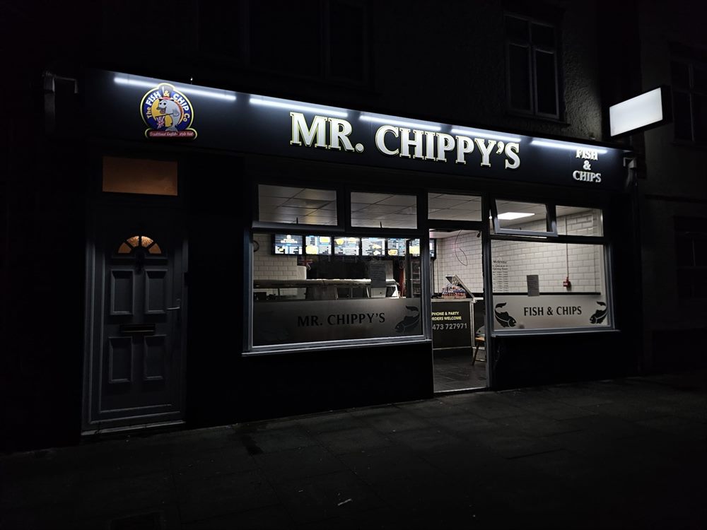 Illuminated fish and chips shopfront
