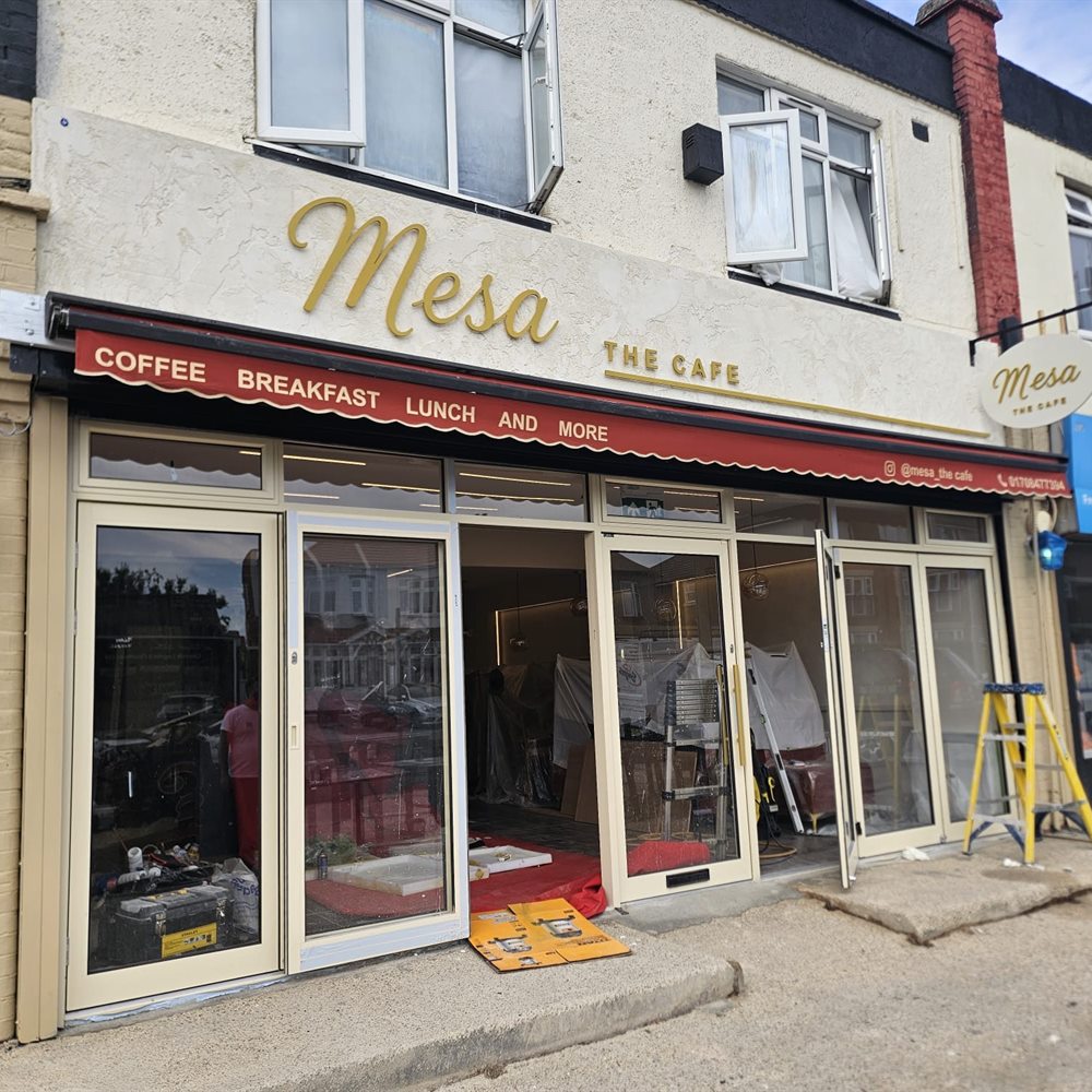 Mesa The Cafe shopfront fascia and projecting sign