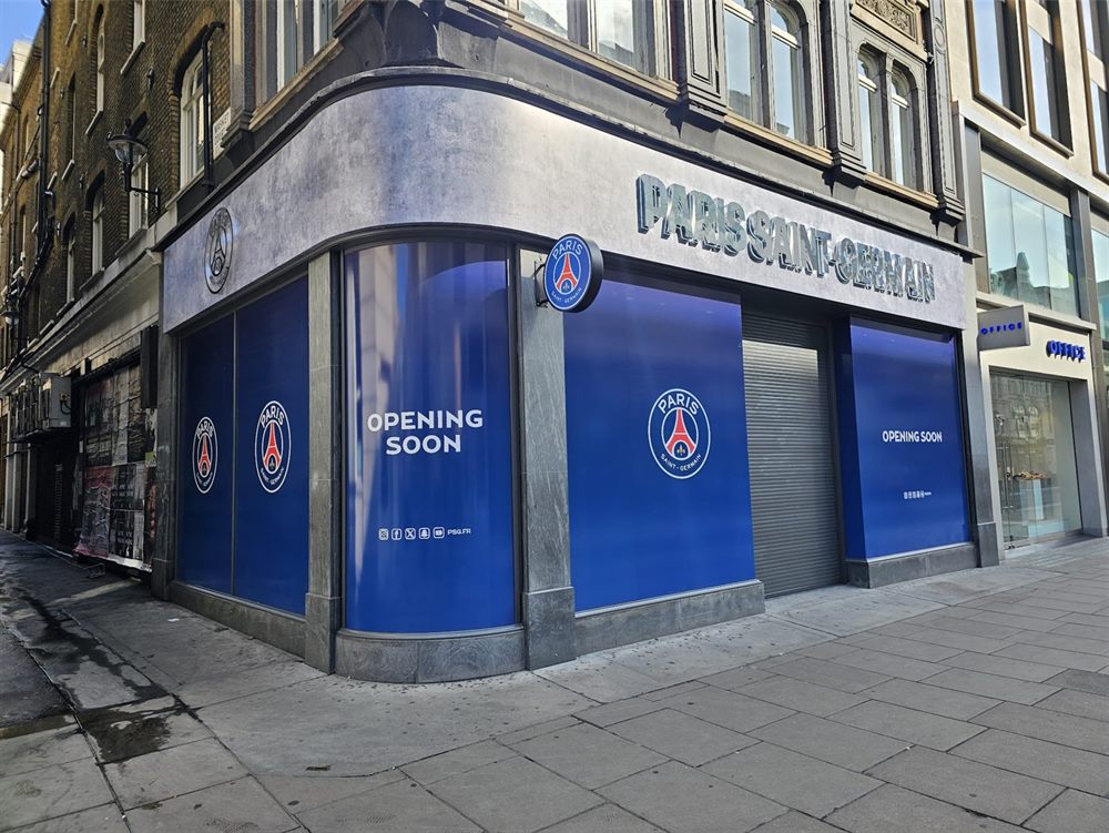 Blue full-window shopfront graphics