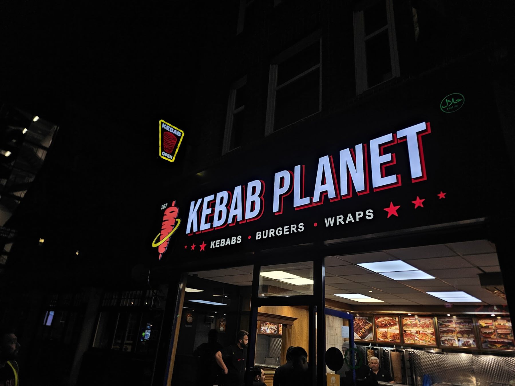 Illuminated restaurant shopfront sign