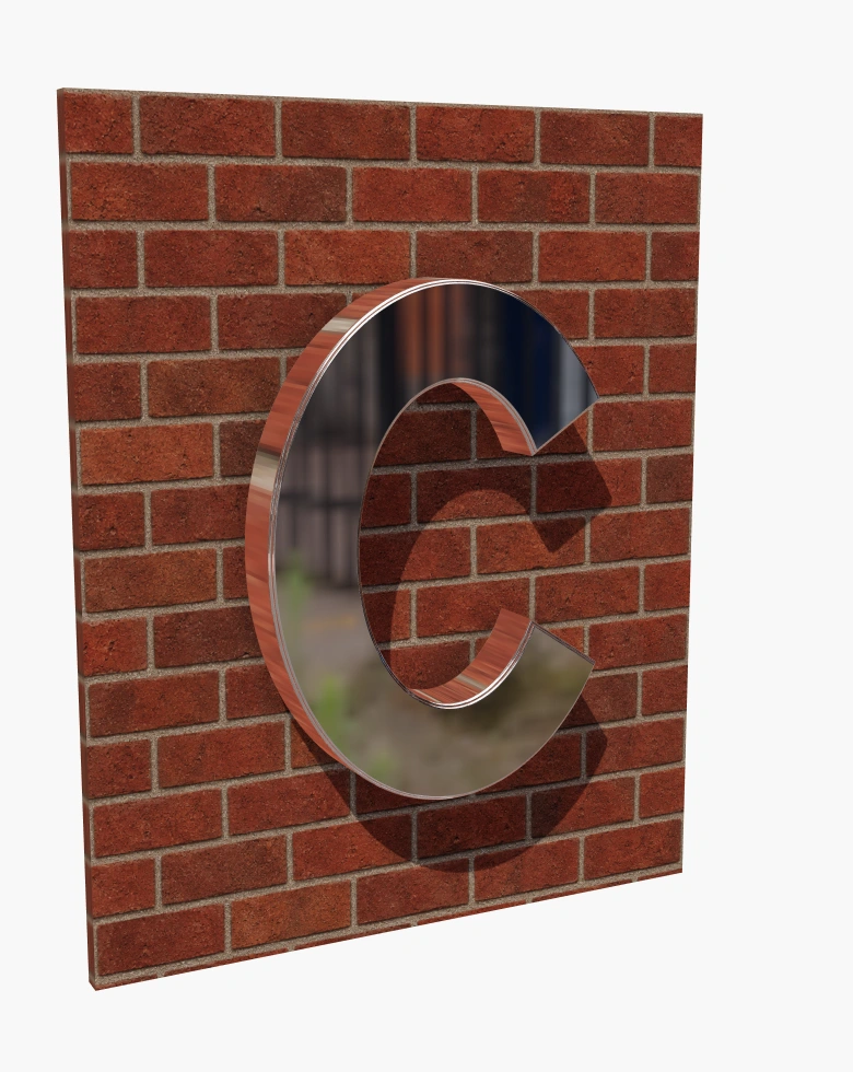 Metal C sign with warm halo lighting in daylight