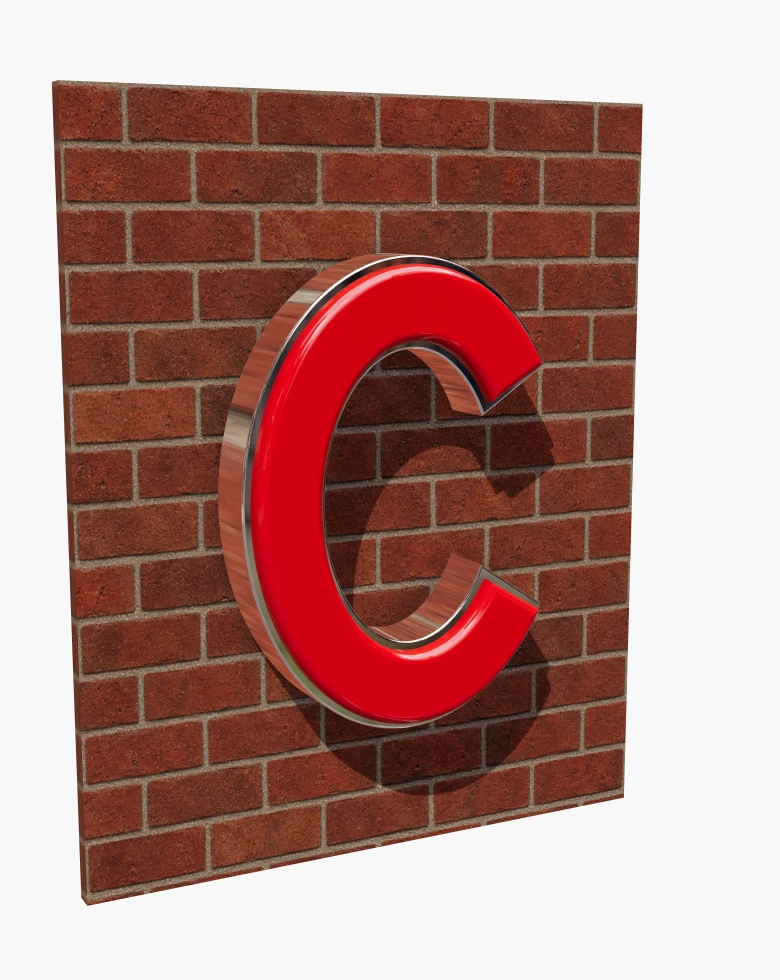 Rounded red C sign with a metal rim in daylight