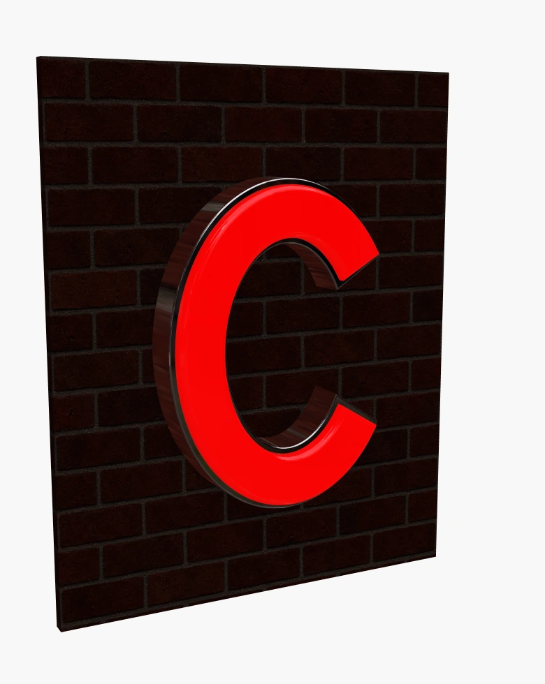 Rounded red C sign with a metal rim at night