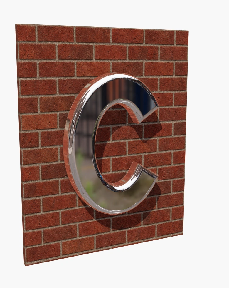 Bevelled metal C sign in daylight