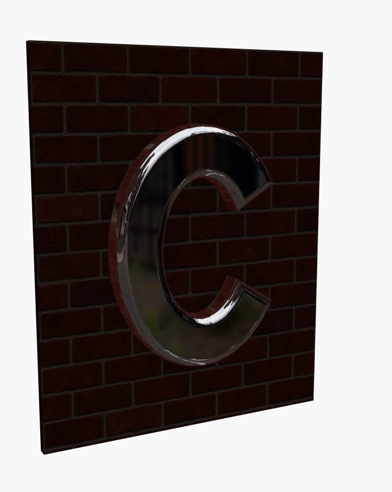 Bevelled metal C sign at night
